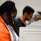 People cast their ballots ahead of the Tuesday, Nov. 6, general election at Jim Miller Park, Saturday, Oct. 27, 2018, in Marietta, Ga.